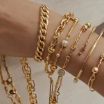 Leonardo_Kino_XL_A_display_of_multiple_minimalist_gold_brac_0